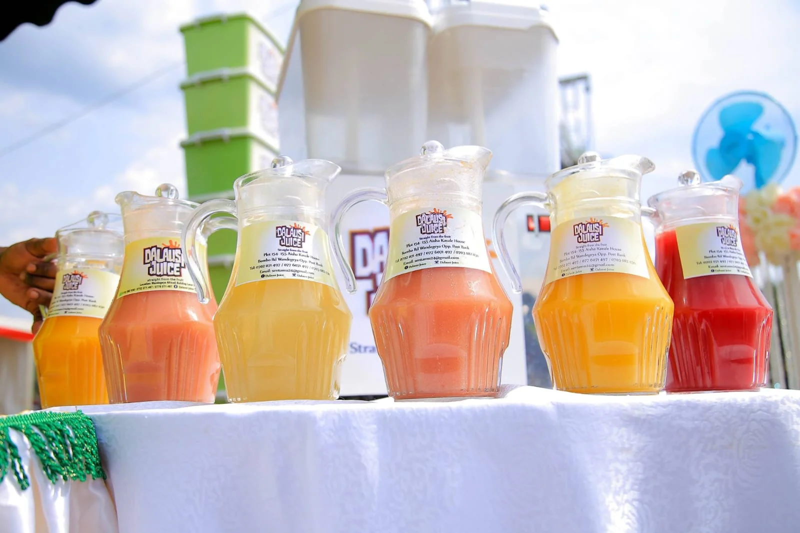 Dalausi’s colourful fresh juices in branded glass jugs